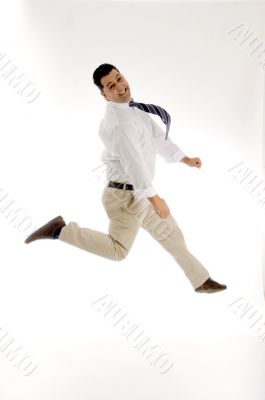 businessman leaping in mid of air