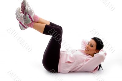 side view of smiling exercising female