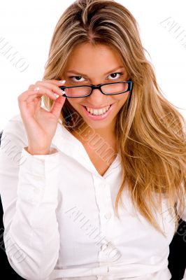 front view of young woman holding eyewear