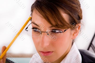 thinking service provider holding a pencil