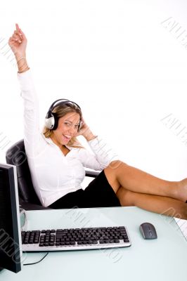 front view of smiling manager listening music