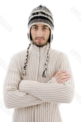 handsome man wearing woolen cap and posing