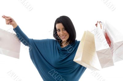 portrait of cheerful model with carry bags