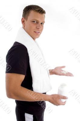 young man holding medicines