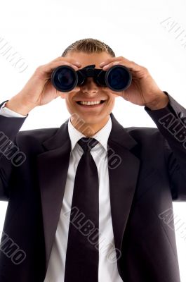 handsome young executive with binoculars
