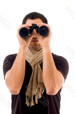 young male holding binocular