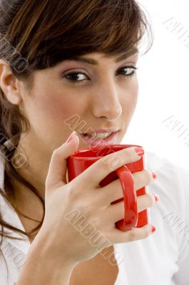front view of female accountant drinking coffee