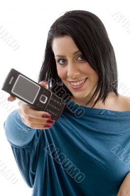 smiling female showing mobile on white background