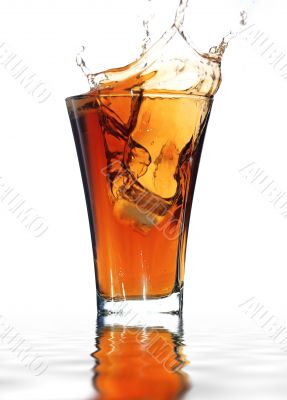 soft drink with a splash isolated on white