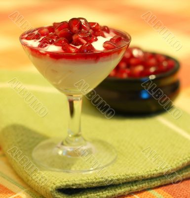 broken ripe pomegranate fruit and seeds