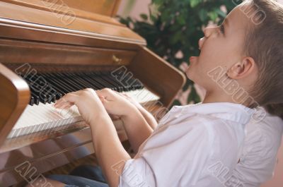 Children Playing the Piano