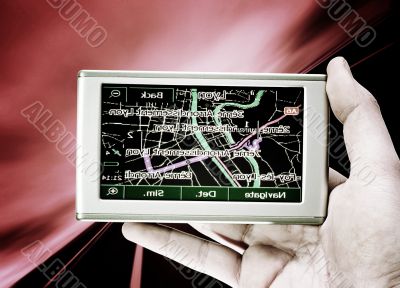 GPS Vehicle navigation system in a man hand.