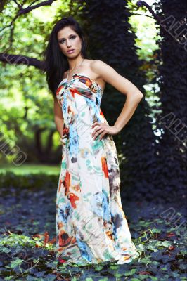 beautiful girl standing on ivy