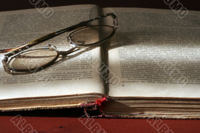 book and spectacles