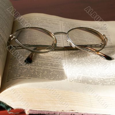 book and spectacles