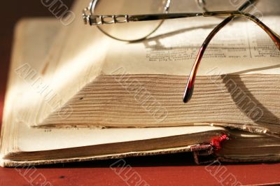 book and spectacles