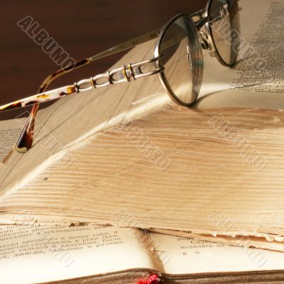 book and spectacles