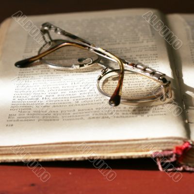 book and spectacles