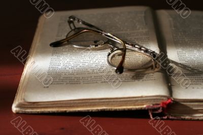 book and spectacles