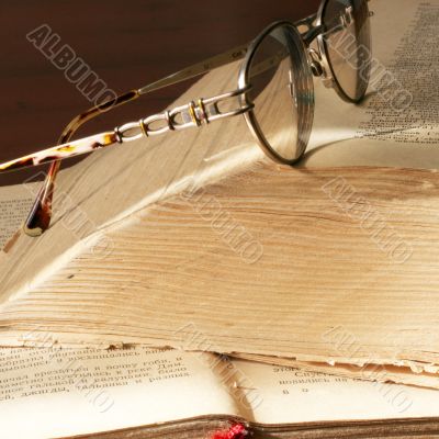 book and spectacles