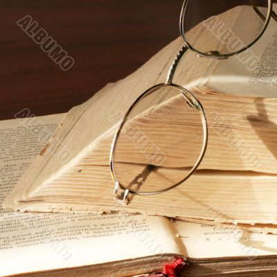 book and spectacles