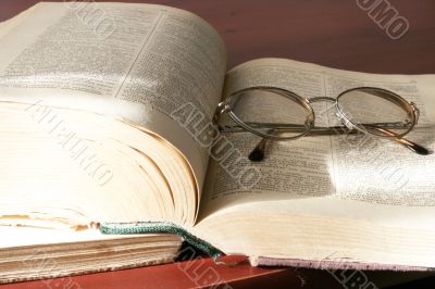 book and spectacles