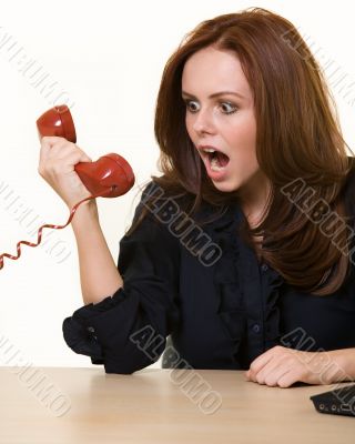 Yelling into the phone