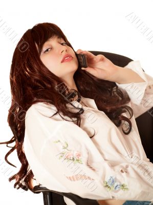 Young beautiful woman in armchair Young beautiful woman in armchair
