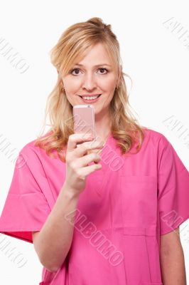 Nurse with pink cell phone