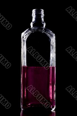 Color Bottle with liquid on black