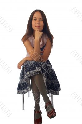 Young woman sitting on the chair