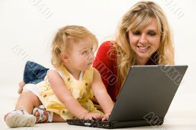 Mom and baby with laptop