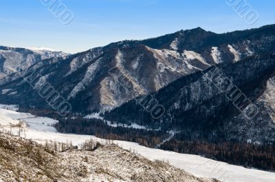 Peak of mountains. Winter in Altay.