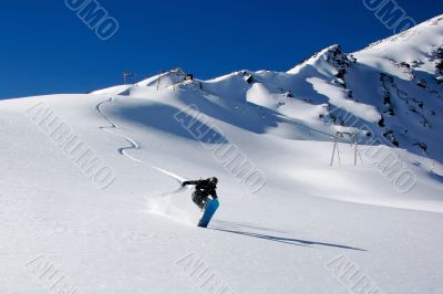 snowboarder ride in powder snowboarder ride in powder