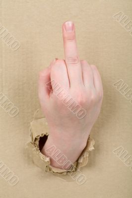 Gesture female hand through cardboard