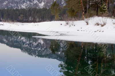 Nonfreezing Blue lake in Mountain Altai. Siberia.