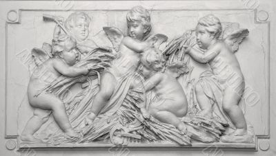 Stony emboss carving of angels Stony emboss carving of angels