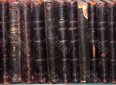 Row of old books cover spines