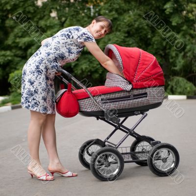 Woman with baby carriage