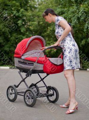 Woman with baby carriage