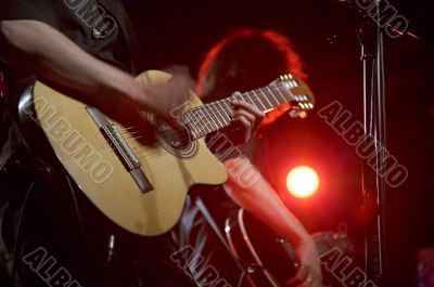 Two guitarists on live concert