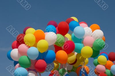 Countless colorful balloons in deep blue sky