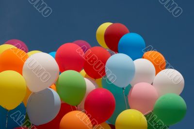 Countless colorful balloons in deep blue sky