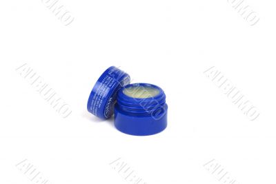 Lip balm in blue container