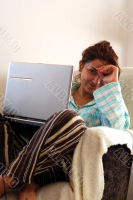 young woman using laptop