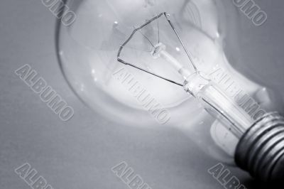 Background with lit lightbulb