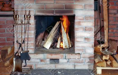 Fireplace with fire irons Fireplace with fire irons