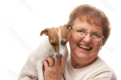 Happy Attractive Senior Woman with Puppy
