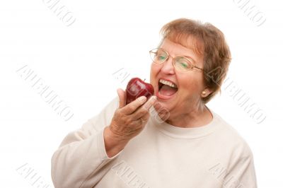 Attractive Senior Woman with Apple
