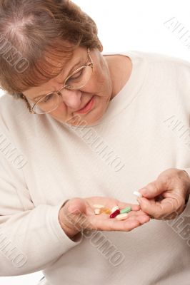 Attractive Senior Woman and Pills
